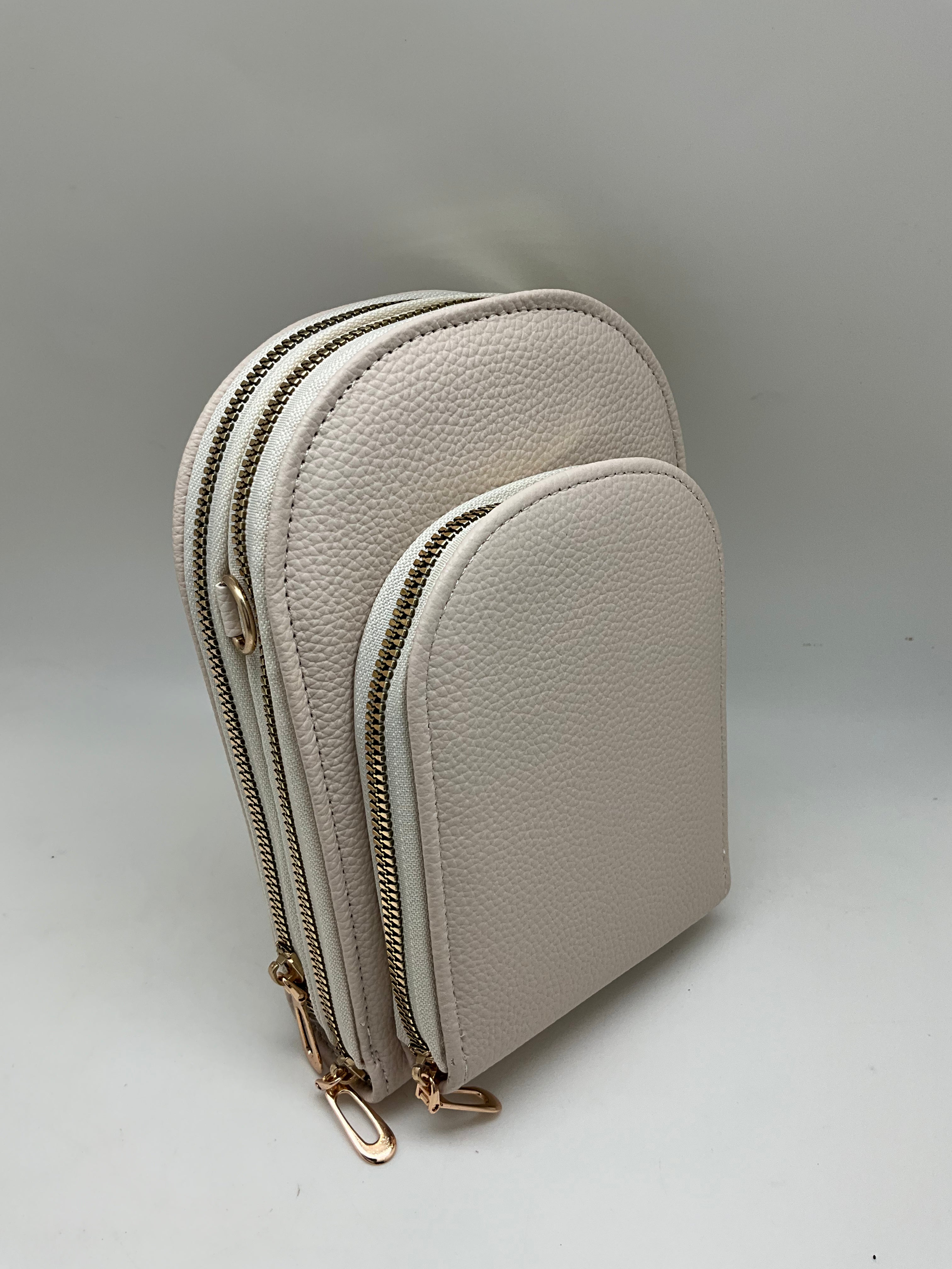 CROSSBODY OVAL 3 ZIPPERED  POCKET BAG